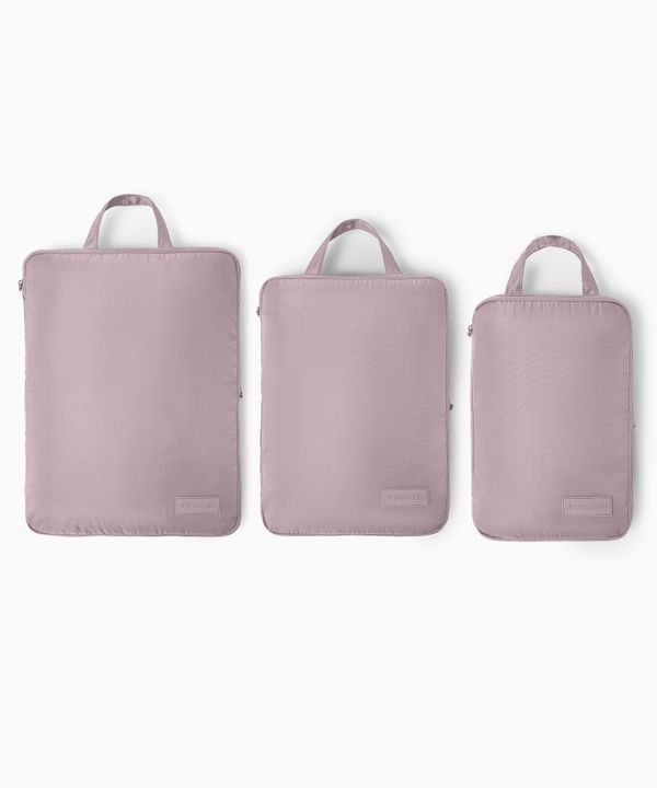 Zestaw kompresyjnych organizerów podróżnych różowy