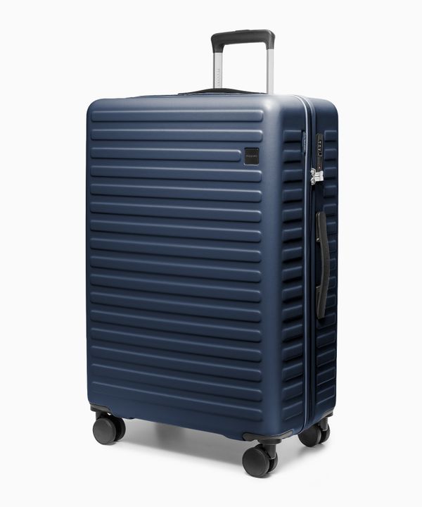 Walizka duża na kółkach z poliwęglanu granatowa