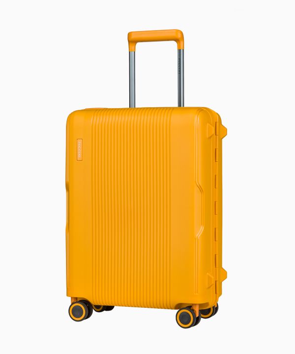 Kabinowa żółta walizka zamykana na klamry