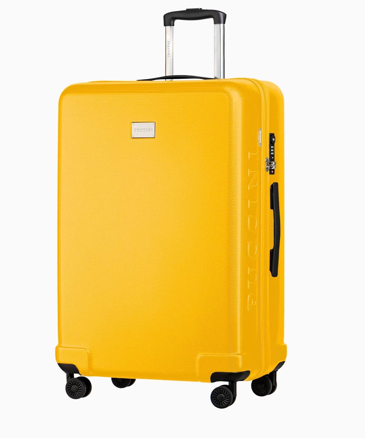 Żółta twarda walizka duża o strukturze plastra miodu