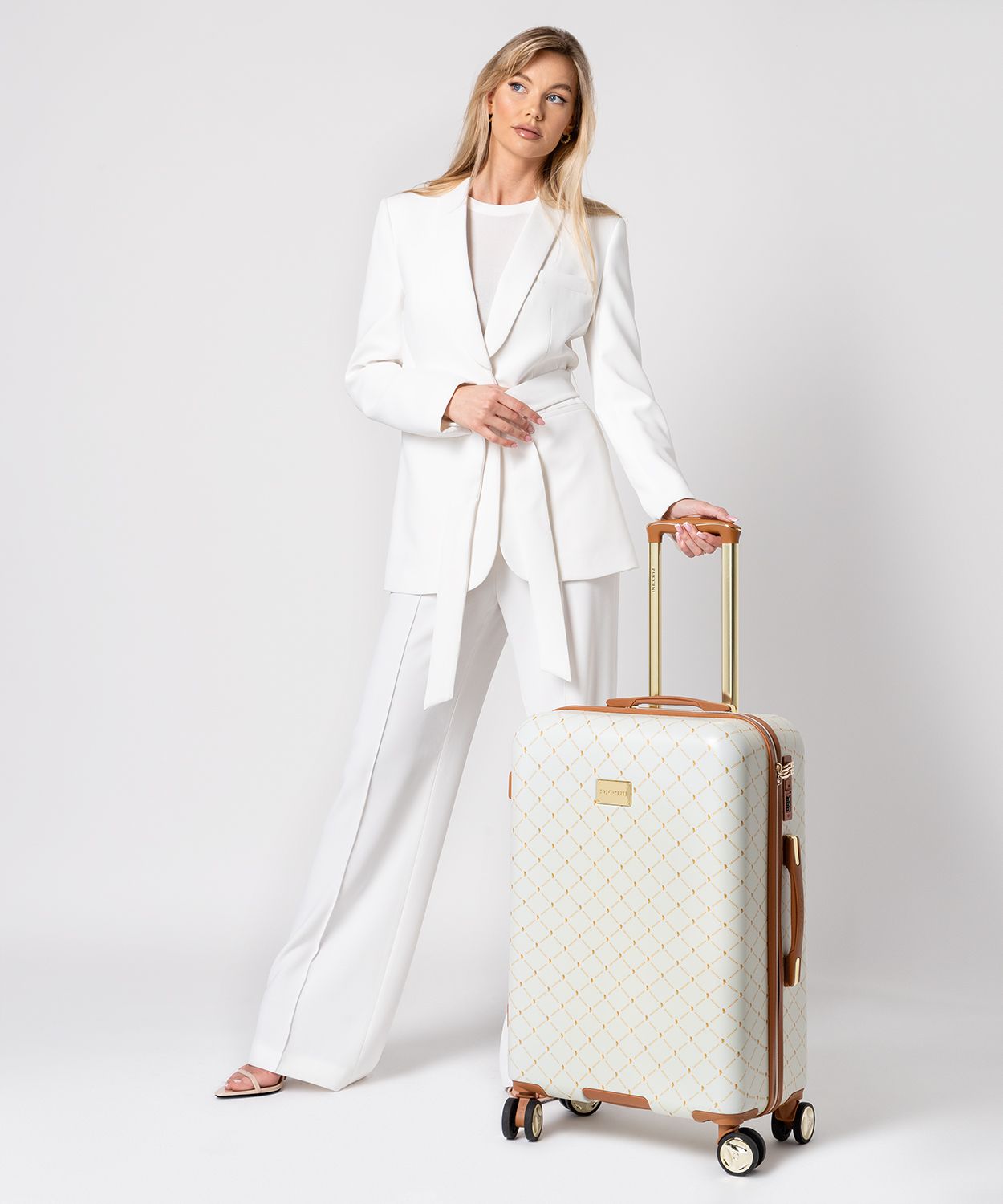 Średnia beżowa walizka monogram