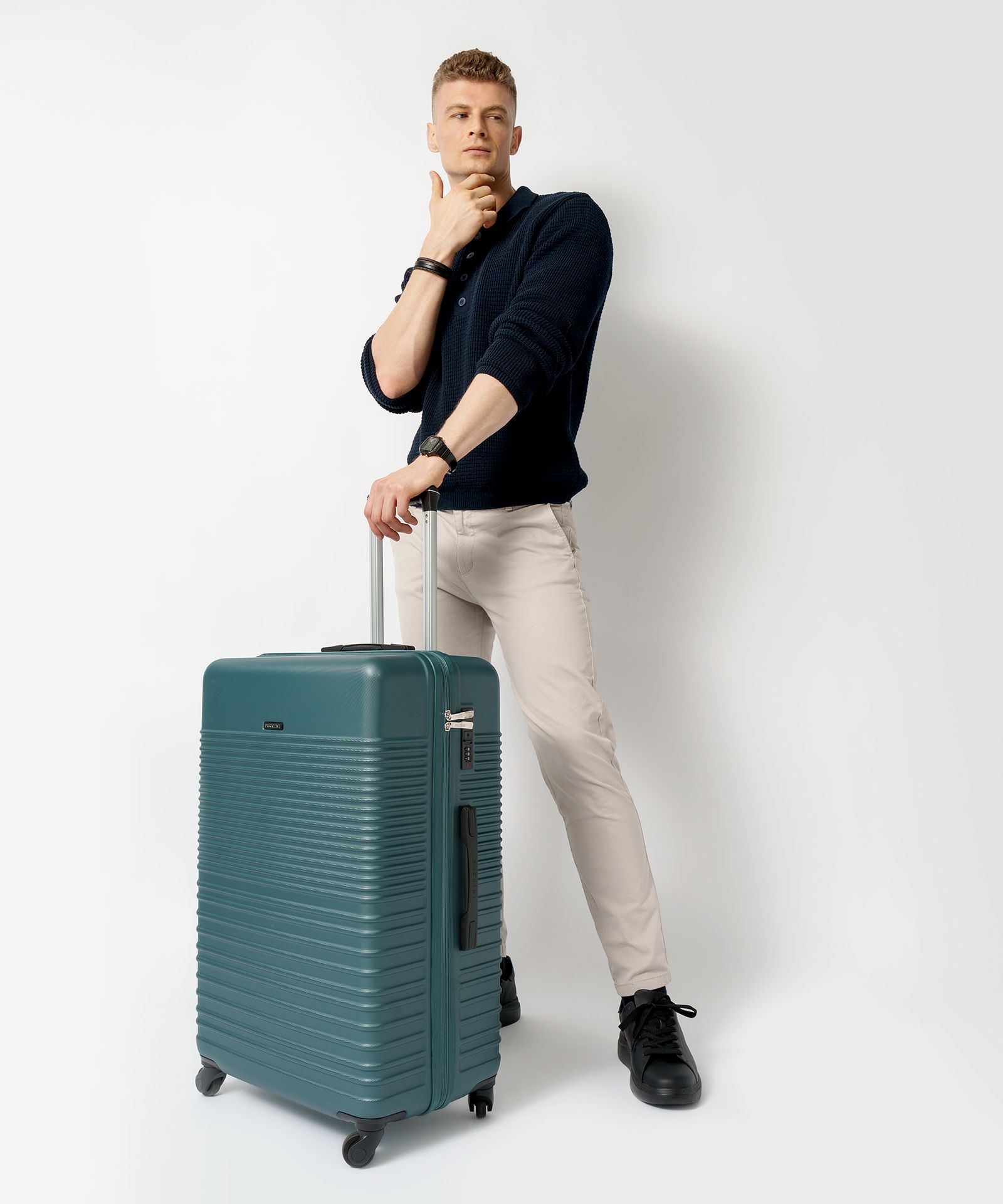 Duża walizka na 4 kółkach zielona