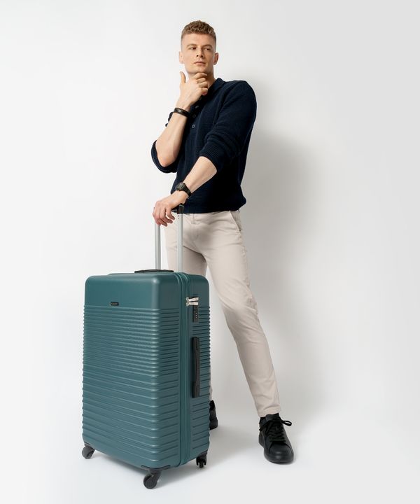 Duża walizka na 4 kółkach zielona