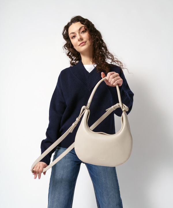 Nowoczesna torebka do noszenia na cztery sposoby beżowa