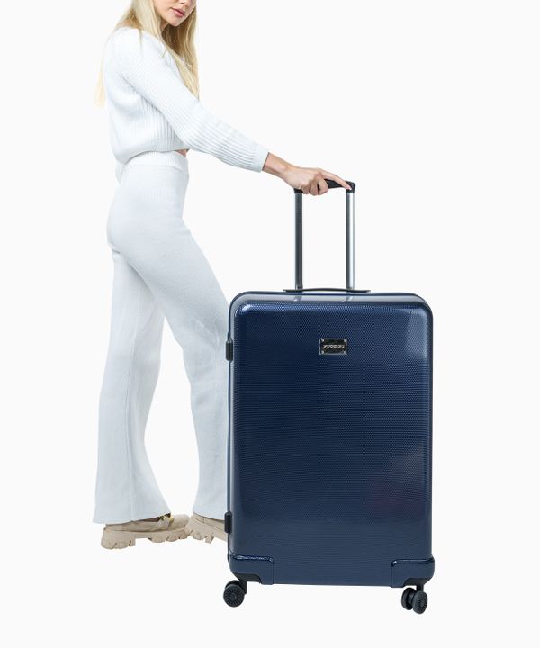 Granatowa twarda walizka duża o strukturze plastra miodu