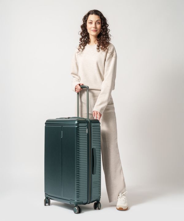 Duża walizka na kółkach ciemnozielona