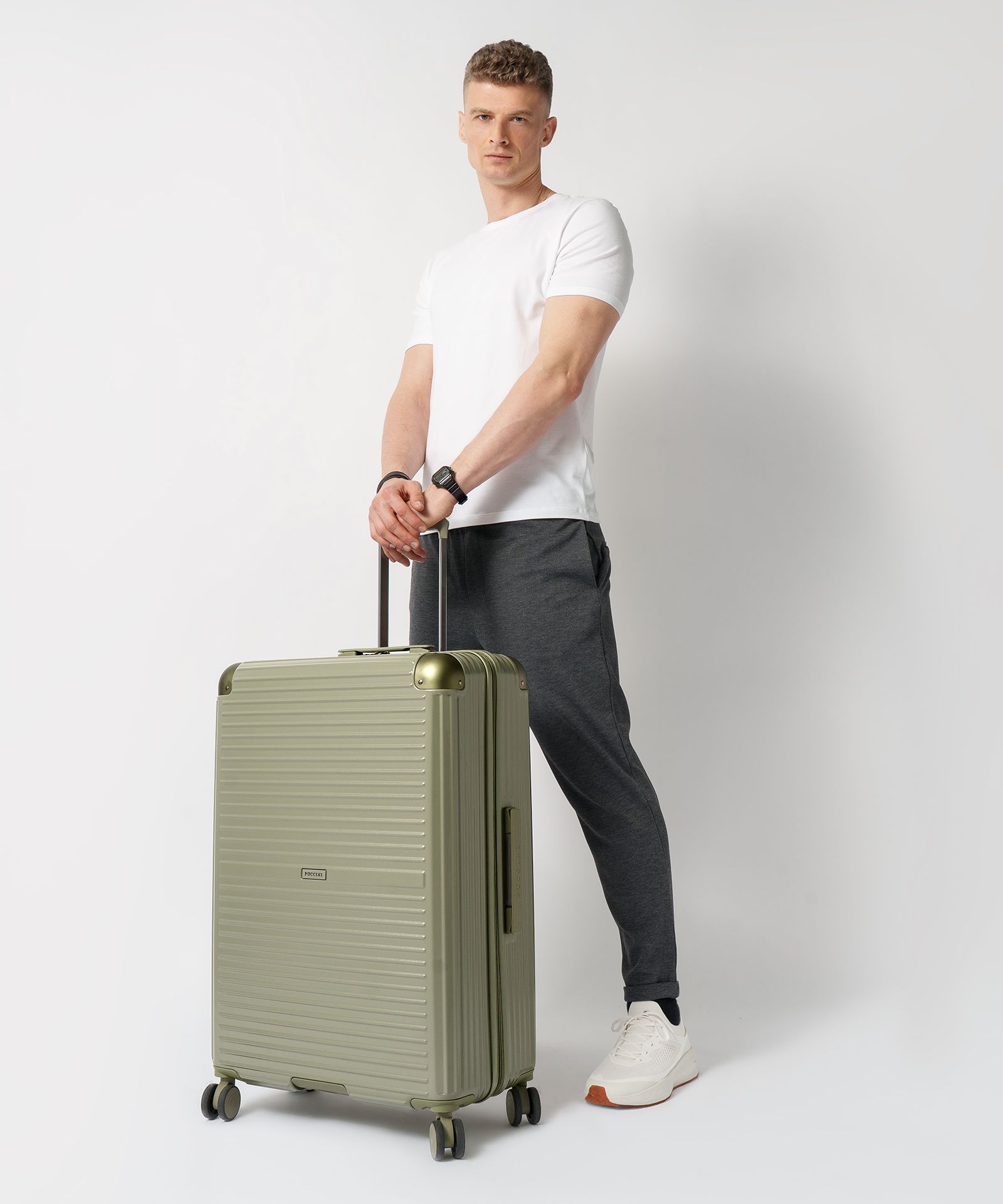 Walizka duża na kółkach z aluminiowymi narożnikami zielona