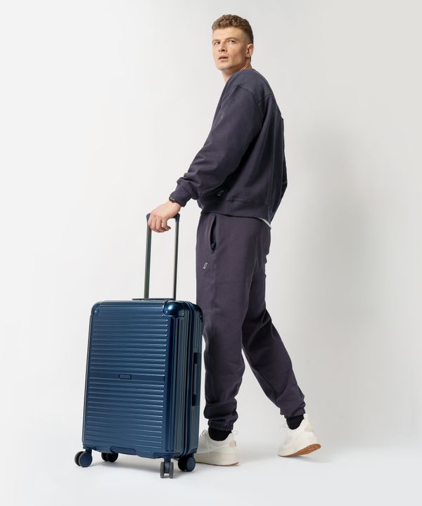 Walizka średnia na kółkach z aluminiowymi narożnikami granatowa