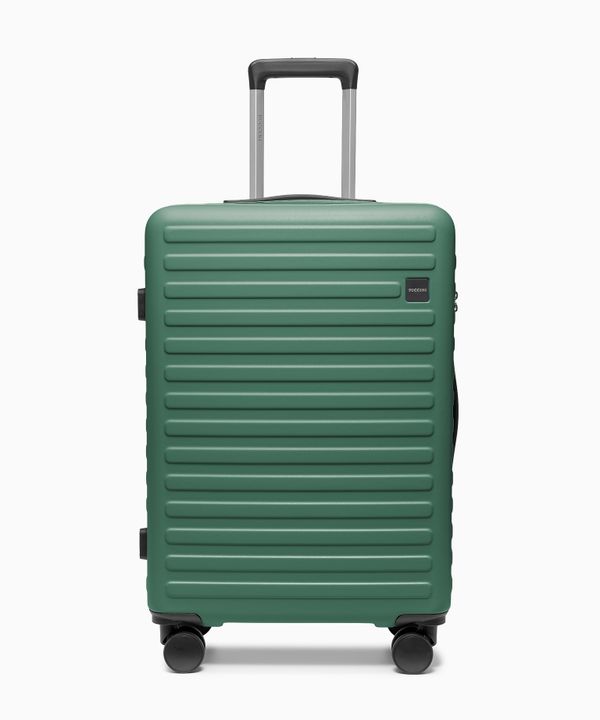 Walizka średnia na kółkach z poliwęglanu zielona