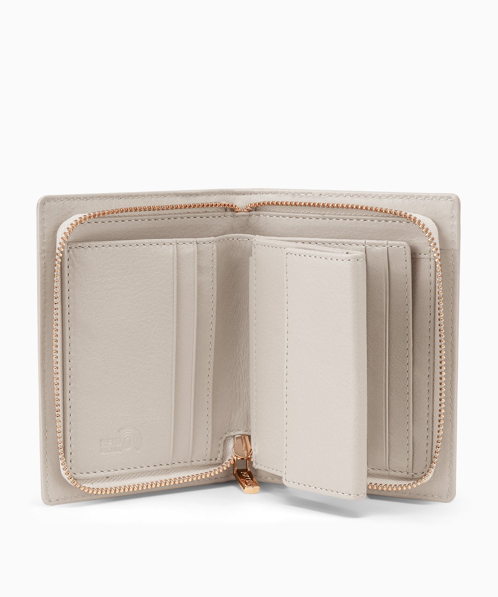 Średni damski portfel skórzany zapinany na zamek beżowy